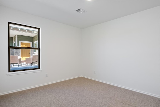 view of carpeted spare room