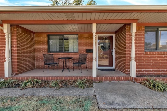 entrance to property with covered porch