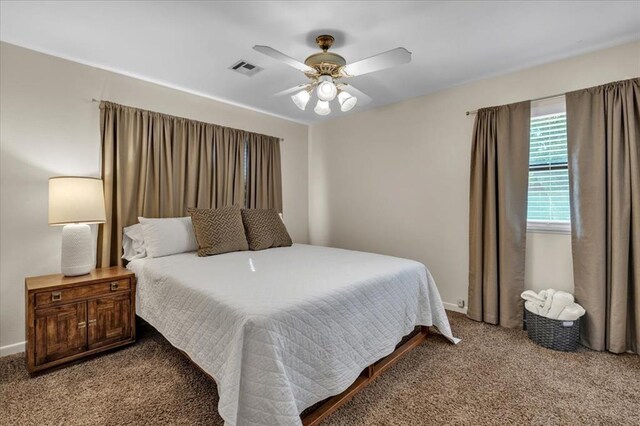 bedroom with carpet floors and ceiling fan