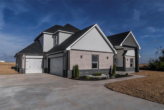 view of side of property with a garage