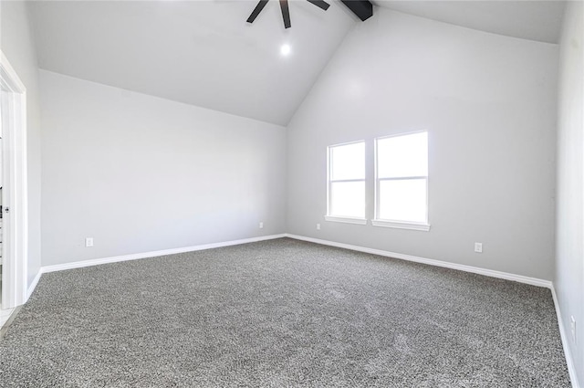 carpeted spare room with beamed ceiling, high vaulted ceiling, and ceiling fan