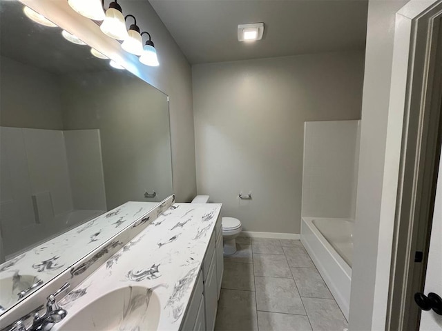 bathroom with tile patterned floors, vanity, and toilet