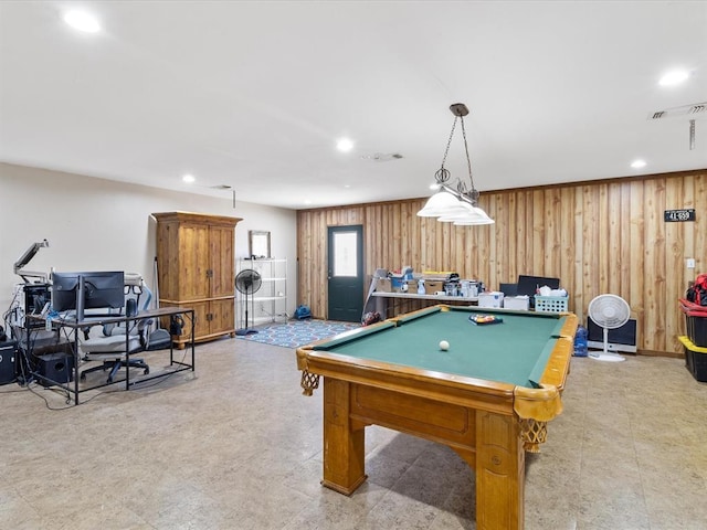 playroom with wood walls and billiards