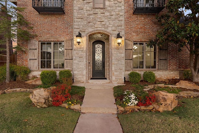 doorway to property with a balcony