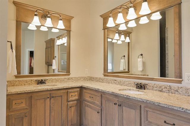 bathroom featuring double vanity and a sink