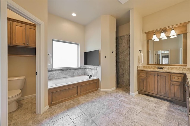 full bath with baseboards, toilet, a tile shower, a bath, and vanity