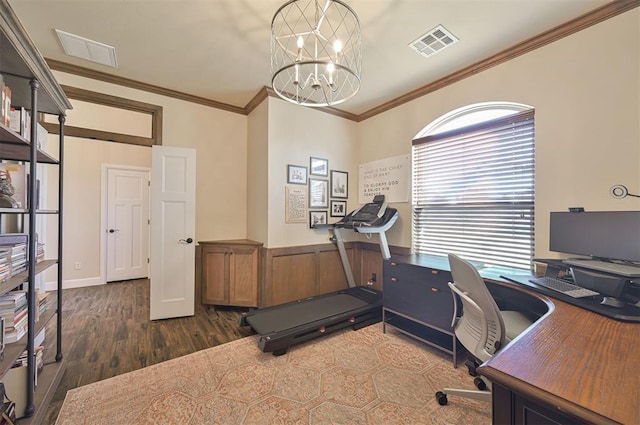 home office featuring a notable chandelier, dark wood-style floors, visible vents, and ornamental molding