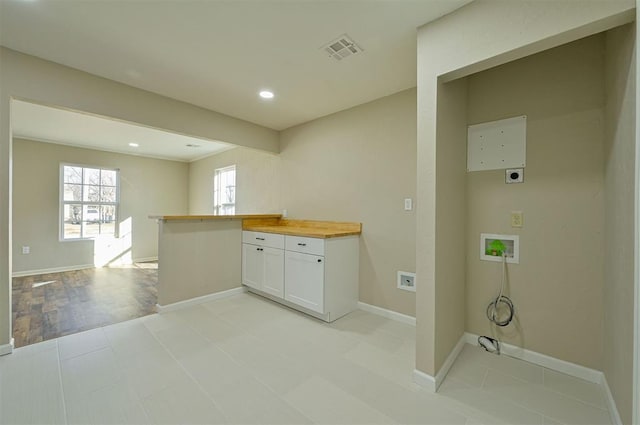 clothes washing area with washer hookup and electric dryer hookup