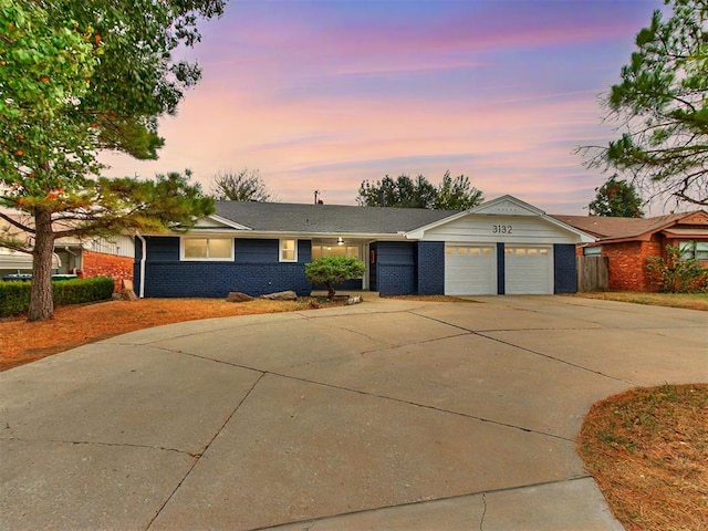 ranch-style house with a garage