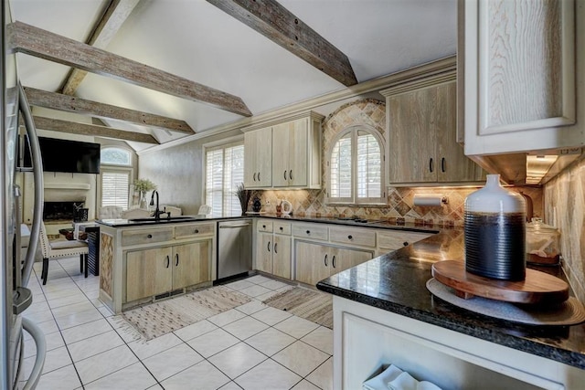 kitchen featuring sink, stainless steel appliances, tasteful backsplash, kitchen peninsula, and light tile patterned floors