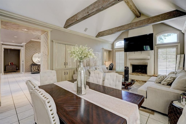 tiled dining space featuring a fireplace and lofted ceiling with beams