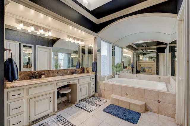 bathroom with vanity, tiled bath, tile patterned floors, and ornamental molding