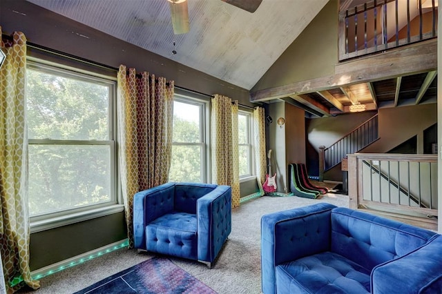 sitting room with carpet, ceiling fan, and lofted ceiling