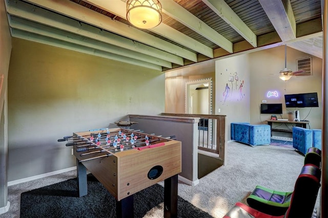 recreation room featuring carpet flooring, ceiling fan, lofted ceiling with beams, and wood ceiling