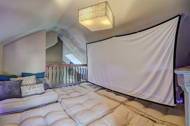 carpeted bedroom featuring vaulted ceiling