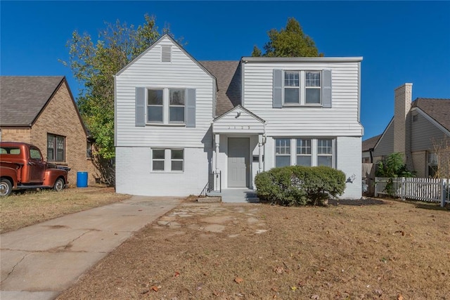 view of front of home with a front lawn