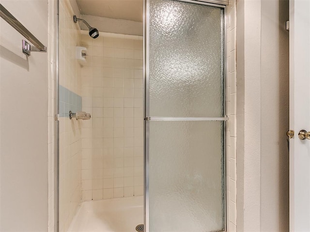 bathroom featuring an enclosed shower