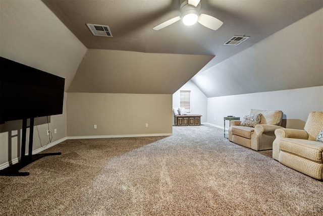 interior space with ceiling fan, carpet floors, and lofted ceiling