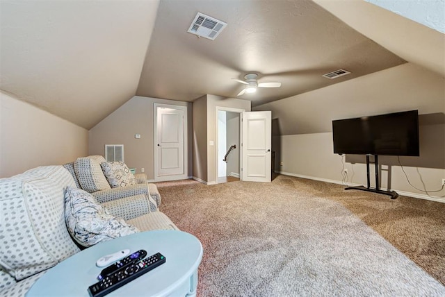 carpeted living room with vaulted ceiling and ceiling fan