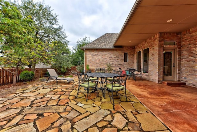 view of patio / terrace featuring outdoor dining space and a fenced backyard