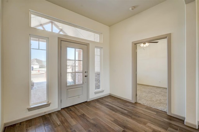 entryway with dark hardwood / wood-style floors