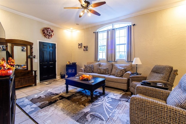 tiled living room with ceiling fan and crown molding