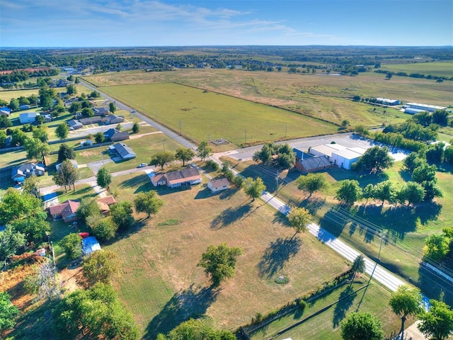 birds eye view of property featuring a rural view