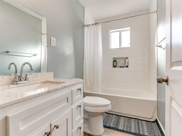 full bathroom featuring toilet, vanity, shower / bath combo, and hardwood / wood-style flooring