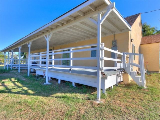 view of home's exterior featuring a lawn