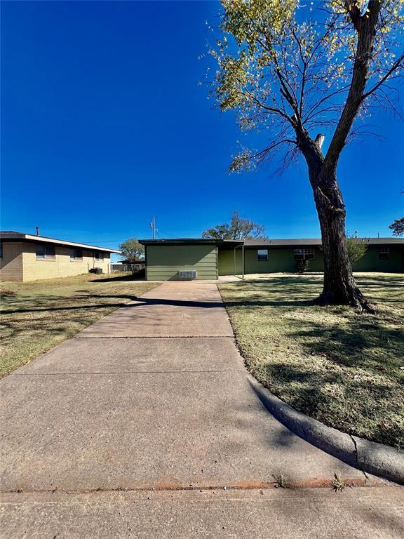 exterior space with a front lawn