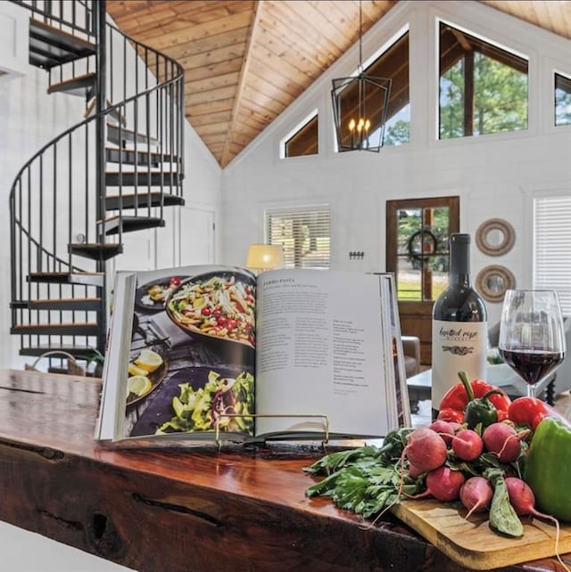 room details featuring an inviting chandelier and wooden ceiling