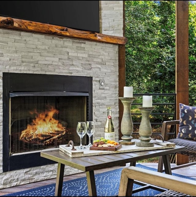 exterior details with an outdoor stone fireplace