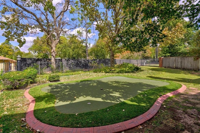 view of yard with a fenced backyard