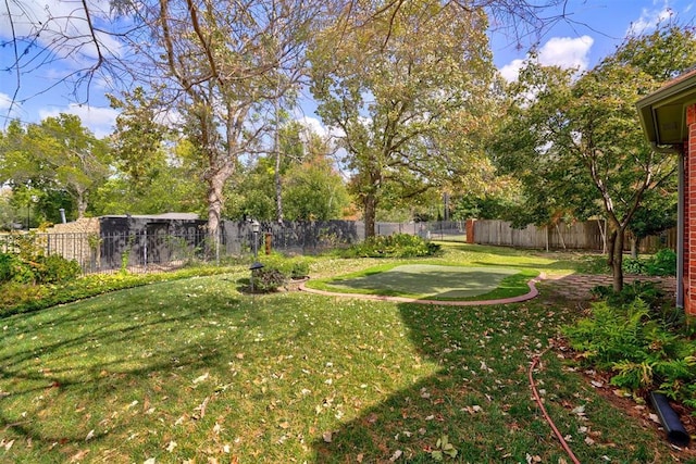 view of yard featuring a fenced backyard