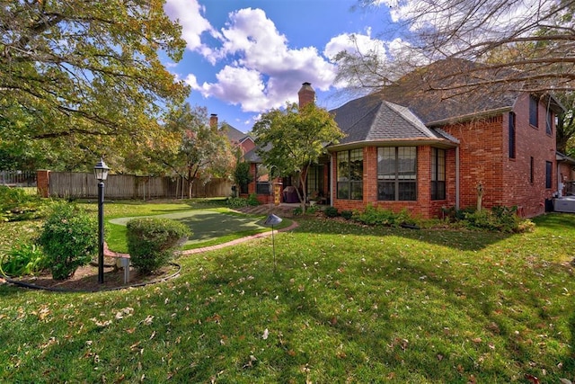 view of yard with fence