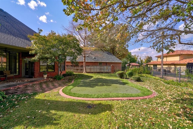 view of yard featuring fence