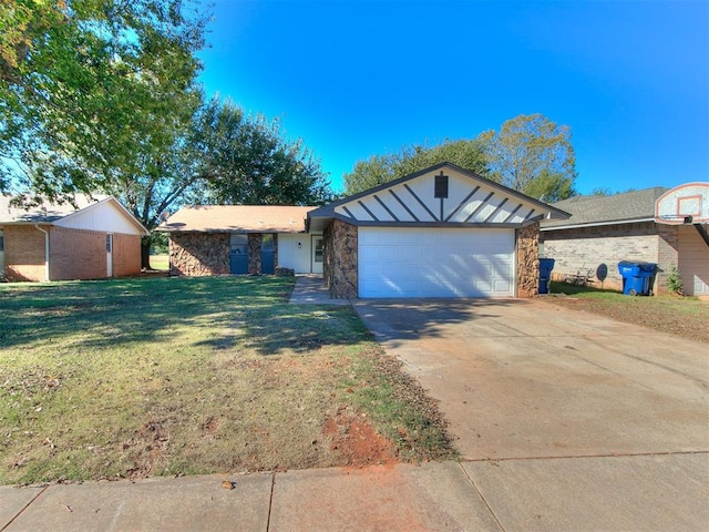 view of front of home featuring a garage and a front lawn