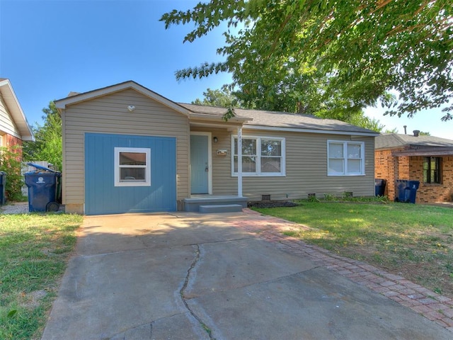 ranch-style house featuring a front yard