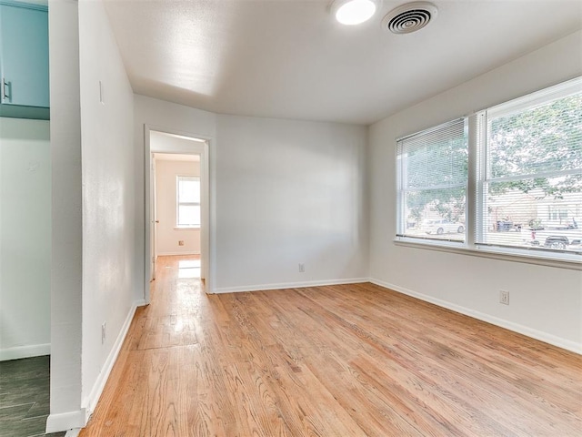 empty room featuring light hardwood / wood-style floors