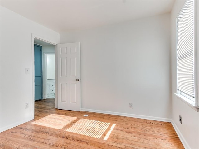 empty room featuring light hardwood / wood-style floors