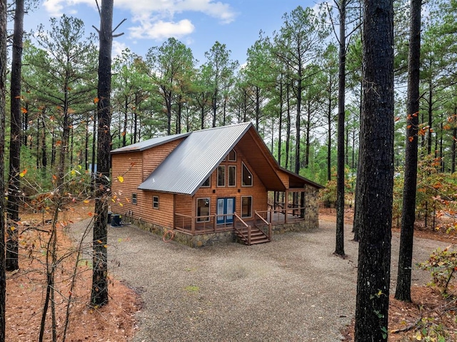 view of front of property featuring covered porch and central AC unit