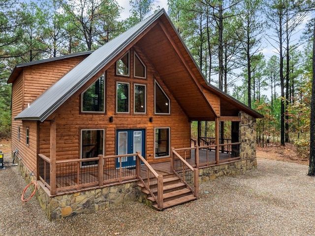 rear view of property featuring french doors