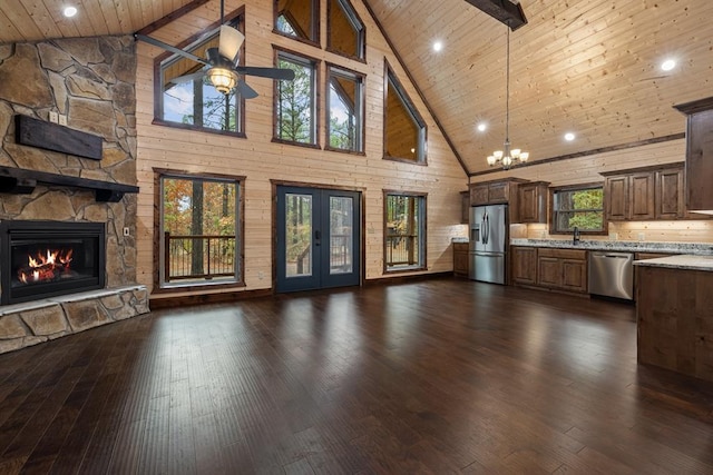 unfurnished living room featuring wooden ceiling, high vaulted ceiling, ceiling fan, a fireplace, and dark hardwood / wood-style flooring