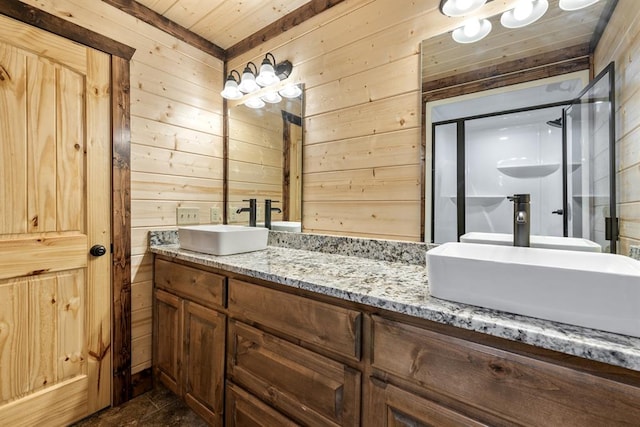 bathroom featuring wood walls, a shower with door, vanity, and wood ceiling