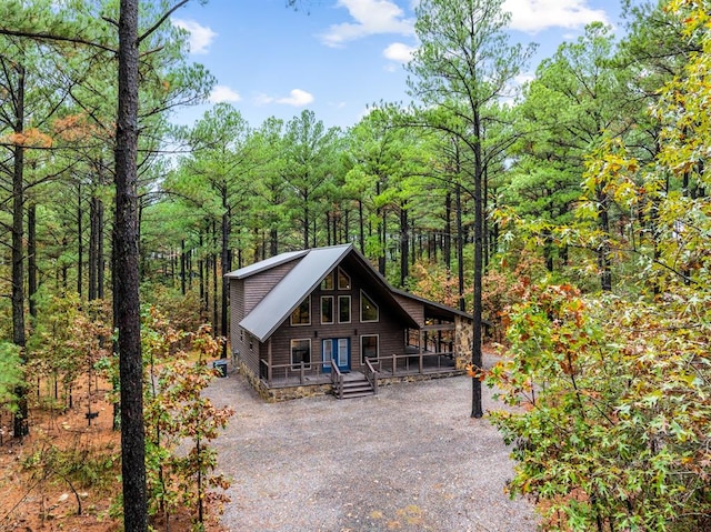 view of front of home featuring a wooden deck