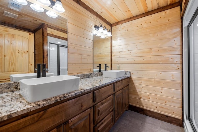 bathroom with wooden walls, tile patterned flooring, and wood ceiling