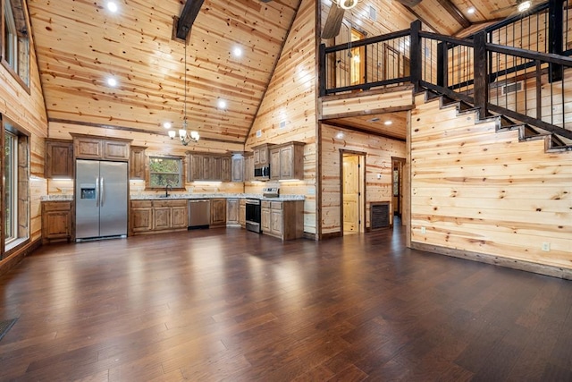 72 Xpress Ln, Broken Bow, OK 74728 - unfurnished living room with high vaulted ceiling, a chandelier, wooden ceiling with exposed beams, dark wood finished floors, and stairway