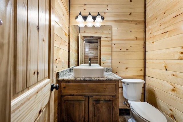 72 Xpress Ln, Broken Bow, OK 74728 - half bath featuring toilet, wooden walls, and vanity