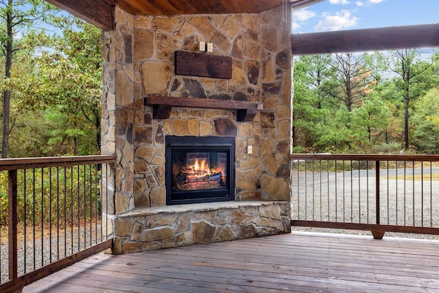 72 Xpress Ln, Broken Bow, OK 74728 - wooden terrace featuring an outdoor stone fireplace