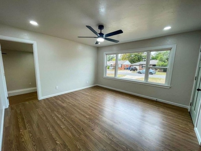 interior space featuring dark hardwood / wood-style flooring and ceiling fan